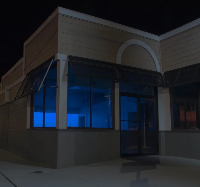 Blue shop at night